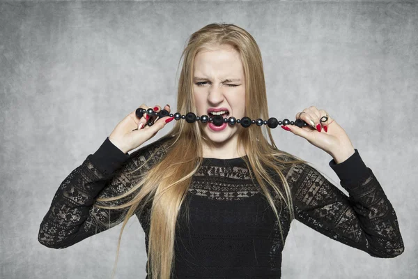 Young beautiful girl with necklace — Stock Photo, Image