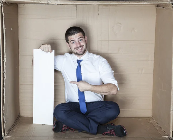 Empresário feliz apontando para o espaço de cópia — Fotografia de Stock