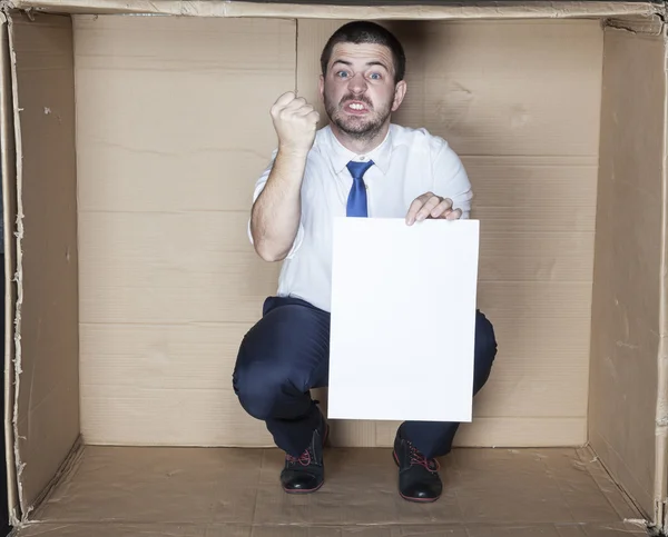 Businessman threatens fist — Stock Photo, Image