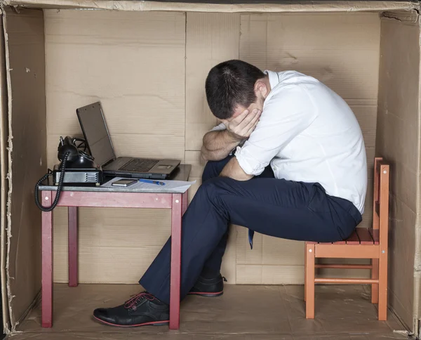 businessman crying with pain