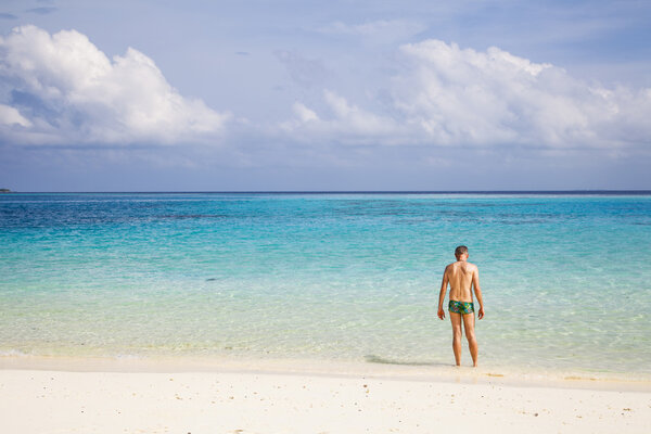 lonely man on the beach