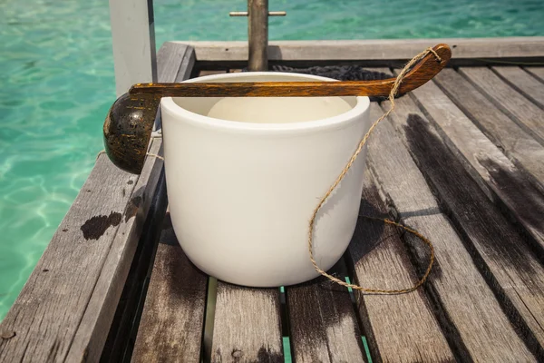 Bowl of water for watering feet — Stock Photo, Image