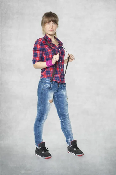 Girl in a plaid shirt — Stock Photo, Image