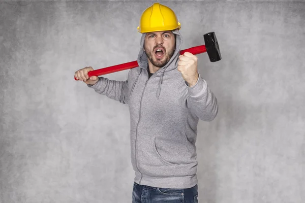 Builder in the helmet are encouraged to work — Stock Photo, Image