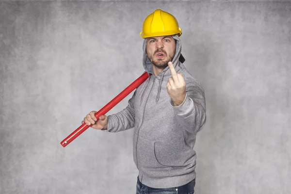 Arga arbetare visar långfingret — Stockfoto