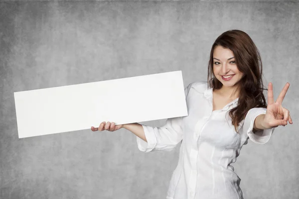 Glückliche junge Geschäftsfrau mit Kopierraum — Stockfoto