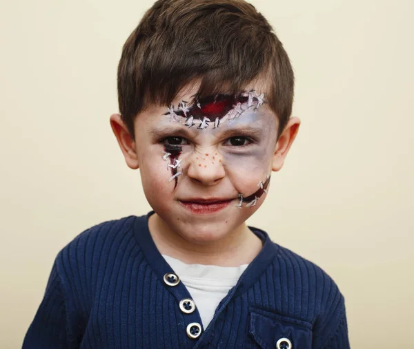 Little cute boy with facepaint like skeleton to celebrate halloween Stock  Photo by ©iordani 125751134