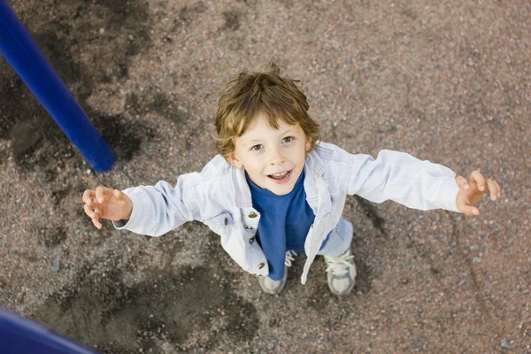 Boy playing on playground