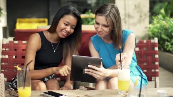 Girlfriends with tablet computer — Stock Video