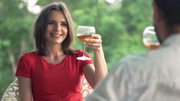 Couple drinking beverages in cafe — Stock Video