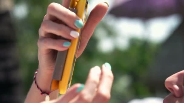 Close-up of woman's hands using smartphone — Stock Video