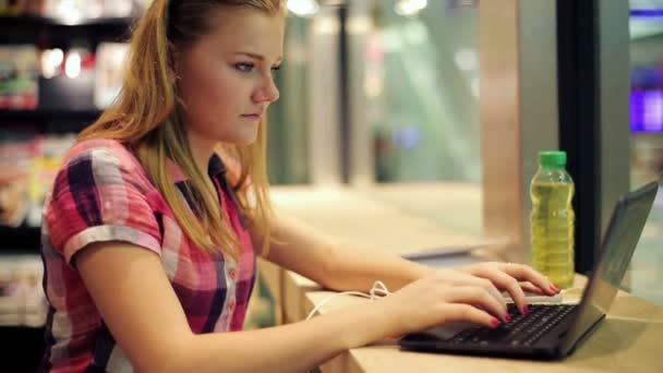 Teenager with modern laptop — Stock Video