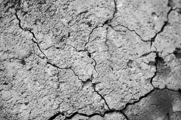 Eski çatlamış çimento. Doku, arka plan, desen. Tasarım ve dekorasyon için somut şablon.