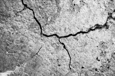 Eski çatlamış çimento. Doku, arka plan, desen. Tasarım ve dekorasyon için somut şablon.