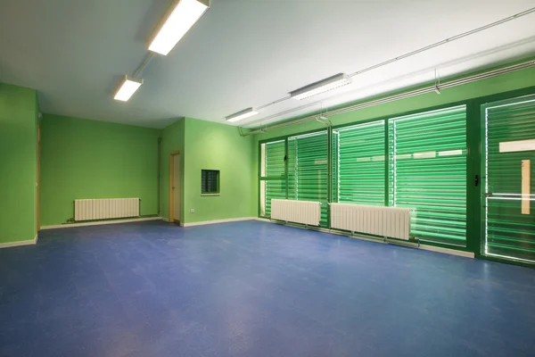 Empty classroom, green and blue. — Stock Photo, Image