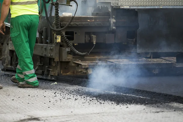 Tracked paver at asphalt pavement works for road repairing — Stock Photo, Image