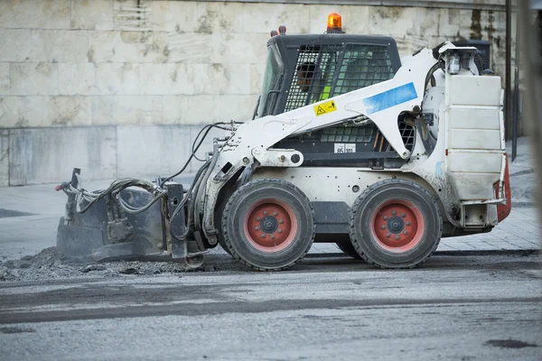 Road repairing works with jackhammer — Stock Photo, Image