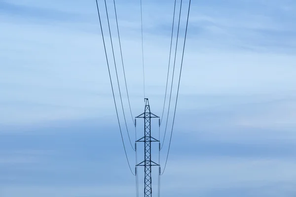 High voltage post at sunset — Stock Photo, Image