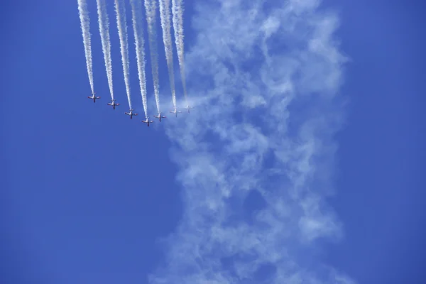 2011 in Granada, GRANADA, spain, SPAIN - JUNE 19: Aerobatic Spanish patrol (Eagle Patrol) perform at an airshow (Open day of the airbase Armilla) on June 19 — Stock Photo, Image