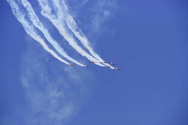 2011 in Granada, GRANADA, spain, SPAIN - JUNE 19: Aerobatic Spanish patrol (Eagle Patrol) perform at an airshow (Open day of the airbase Armilla) on June 19 — Stock Photo, Image