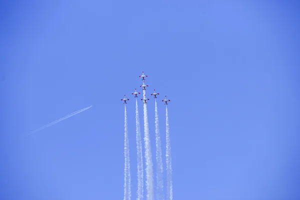 2011 in Granada, GRANADA, spain, SPAIN - JUNE 19: Aerobatic Spanish patrol (Eagle Patrol) perform at an airshow (Open day of the airbase Armilla) on June 19 — Stock Photo, Image