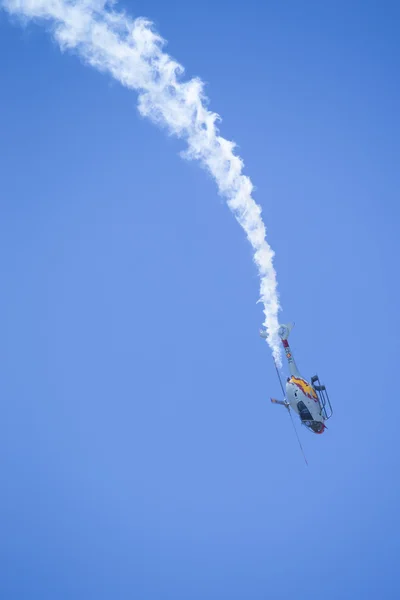 GRANADA,SPAIN - May 18: Aerobatic Spanish helicopter patrol (ASPA Patrol) perform at airshow (10 Aanniversary of Aspa Patrol in Granada) on May 18, 2014 in Granada ,Spain — Stock Photo, Image