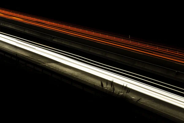 The light trails on the street — Stock Photo, Image