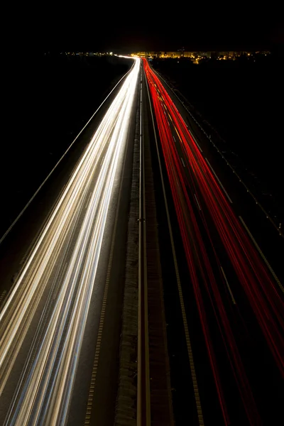 Los senderos de luz en la calle — Foto de Stock