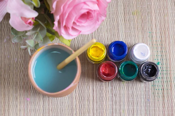 Top view of opened bottles of poster paint — Stock Photo, Image