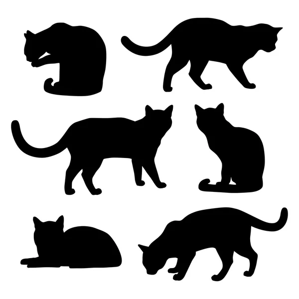Conjunto de siluetas de gatos sobre fondo blanco. Vector . — Vector de stock