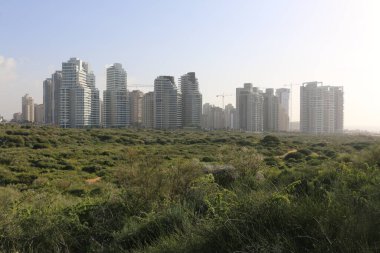 Panoramic View Of City Buildings Against Sky israel netanya clipart