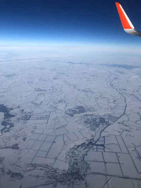 view of Russia in winter from the plane window