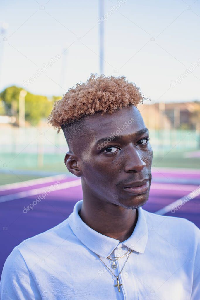 Close up portrait of handsome man with colorful hair