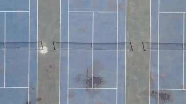 Drone panning away from tennis courts