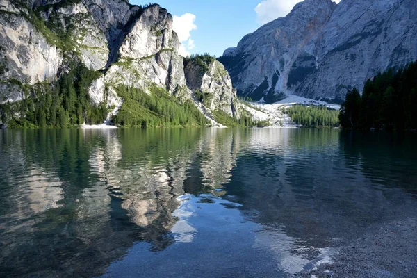 Rock Descend Lap Water Reflected Upper Part Lake Braies — Stock Photo, Image