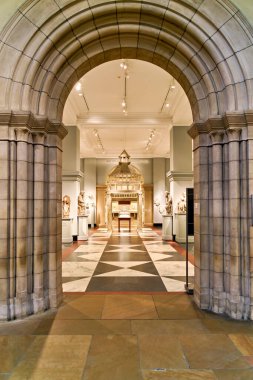 Visitors explore the Medieval Art section at the Metropolitan Museum of Art in Manhattan. The architecture and exhibits draw attention.