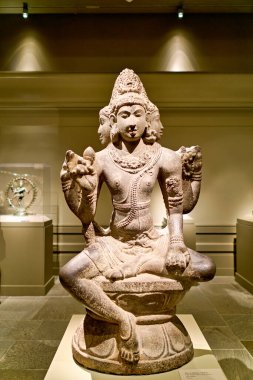 A statue showing Shiva as Mahesha sits in the Asian Art Gallery of the Metropolitan Museum of Art in Manhattan, New York.
