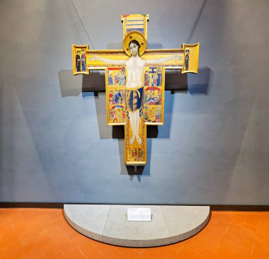 Eserde İsa 'nın yaşamından sahnelerin olduğu bir haç var. Floransa, Toskana, İtalya 'daki Uffizi Galerisi' nde yer almaktadır..