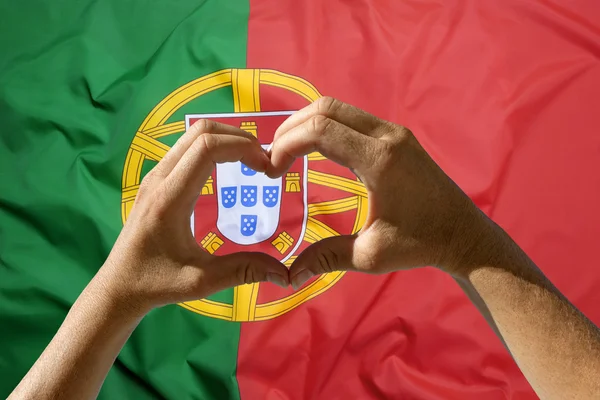Символ сердца рук, флаг Португалии — стоковое фото