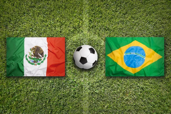 Mexico vs. Brazil flags on soccer field