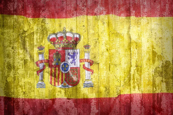 Estilo de grunge da bandeira de Espanha em uma parede de tijolo — Fotografia de Stock