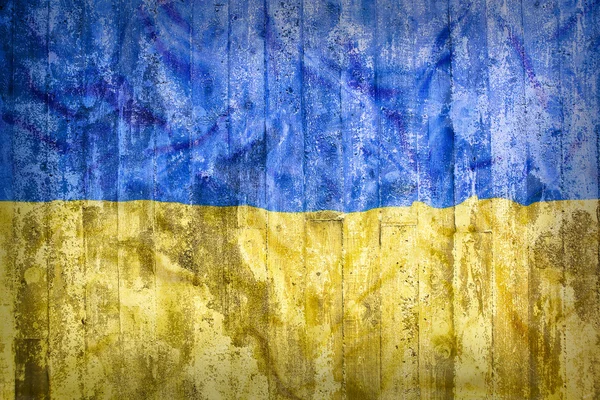 Style grunge flagi Ukrainy na ceglany mur — Zdjęcie stockowe
