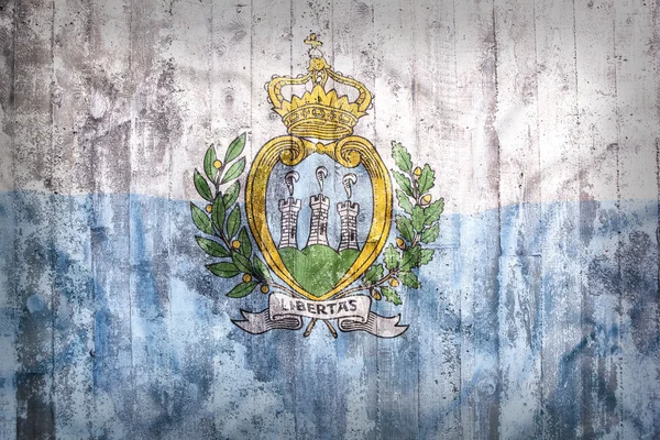 Styl grunge flaga San Marino na ceglany mur — Zdjęcie stockowe