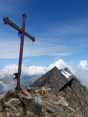 Summit cross at Schonbichler Horn, Berlin high path, Zillertal Alps in Tyrol, Austria