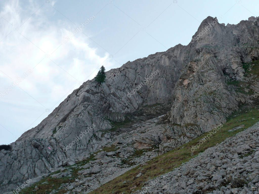 Via ferrata at high mountain lake Seebensee, Zugspitze mountain, Tyrol, Austria in summertime