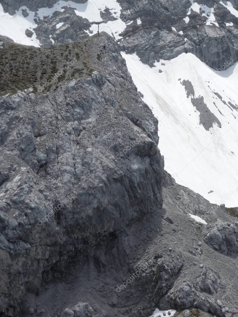 Via ferrata at high mountain lake Seebensee, Zugspitze mountain, Tyrol, Austria in summertime