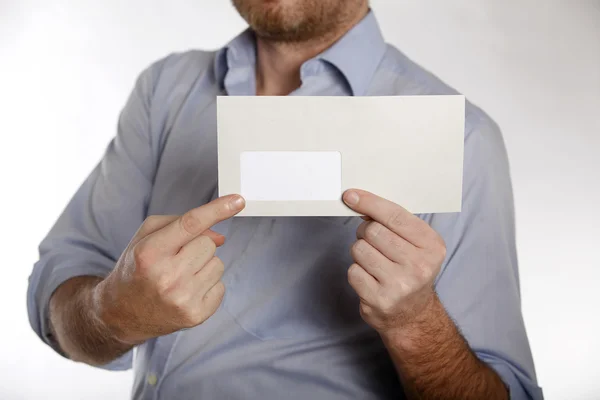 Man holds a letter into the camera — Stock Photo, Image