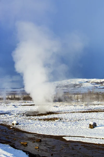 Geyser in a winter landscape in Iceland — Stock Photo, Image
