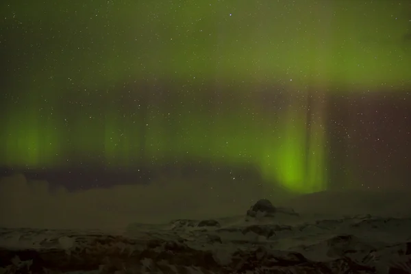 Different colors of northern lights in Iceland — Stock Photo, Image