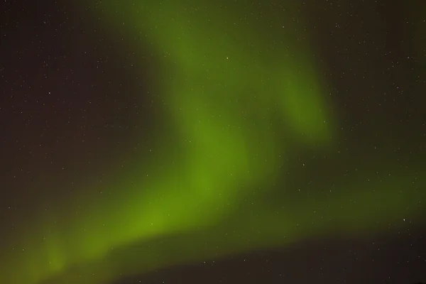 Aurora dinámica con estrellas brillantes en Islandia —  Fotos de Stock